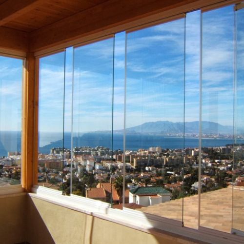 Side folding enclosure in a private house