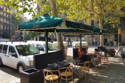 Two green Azores D parasols in the restaurant Dora tapas.