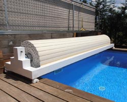 Enrollador de una Cubierta de lamas Access de una piscina