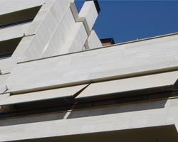 Awning eurosol stor on white building terrace