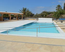Instalación de un enrollador de lamas en piscina pública