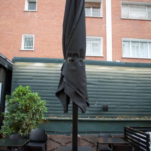 Azores parasol closed with plant stand