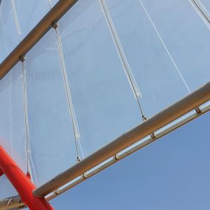 Vertical monolayer ETFE sheets in metallic structure.