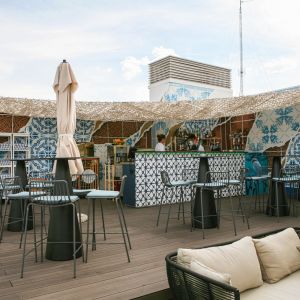 Part of the terrace bar covered with a camouflage canvas