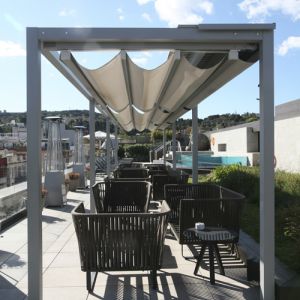 Chill out area covered by a custom pergola