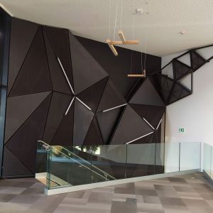 Triangular panels with i-tensing fabric.