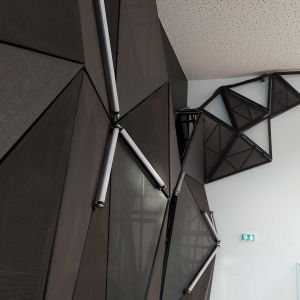 Triangular panels inside the building.