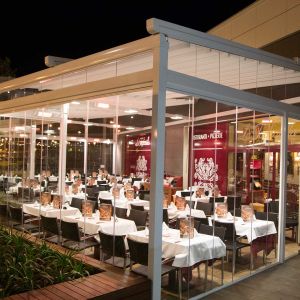 Smooth pergola with enclosures, heating and lighting