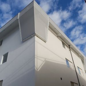 Upper end of the building.